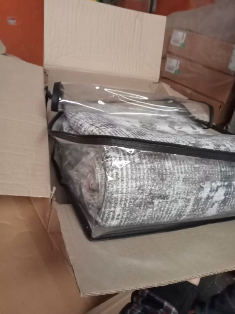 printed rug folded in box 